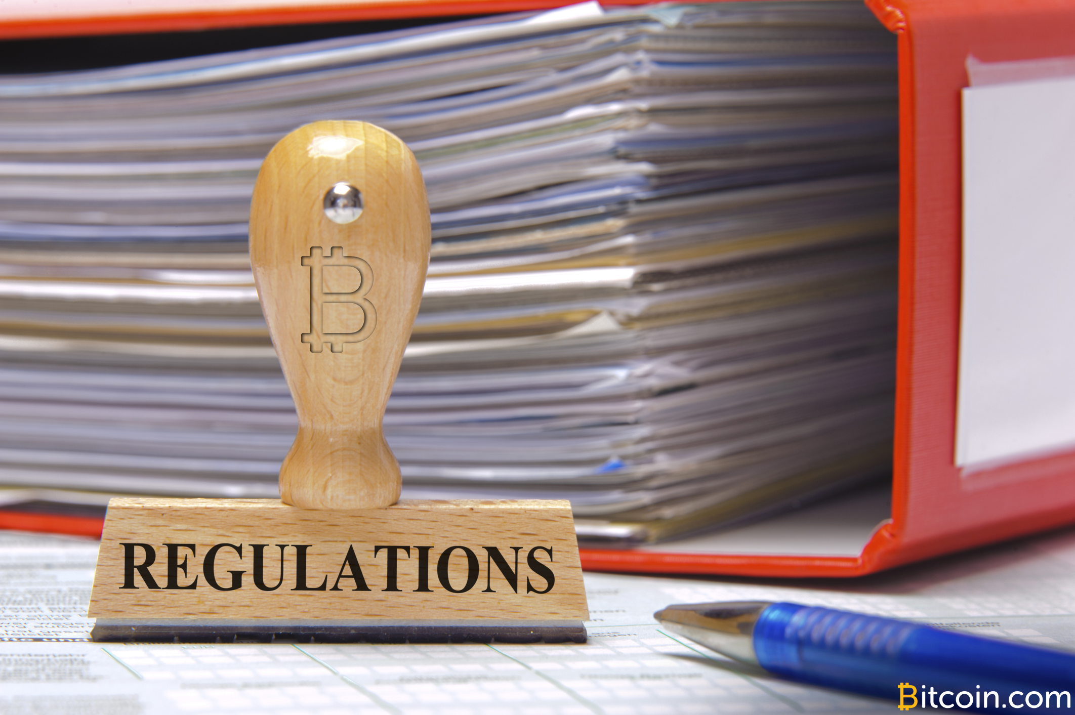 bitcoin regulation stack of bills.png