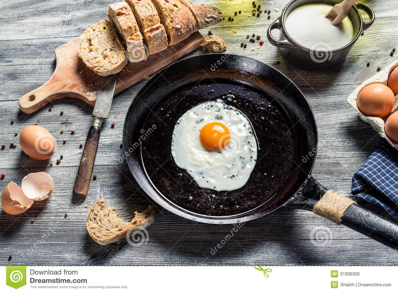 breakfast-made-eggs-bread-old-wooden-table-31906300.jpg