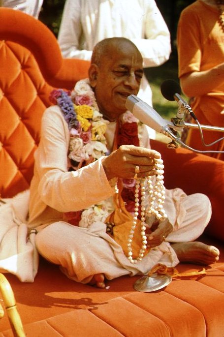 srila-prabhupada-with-initition-beads.jpg