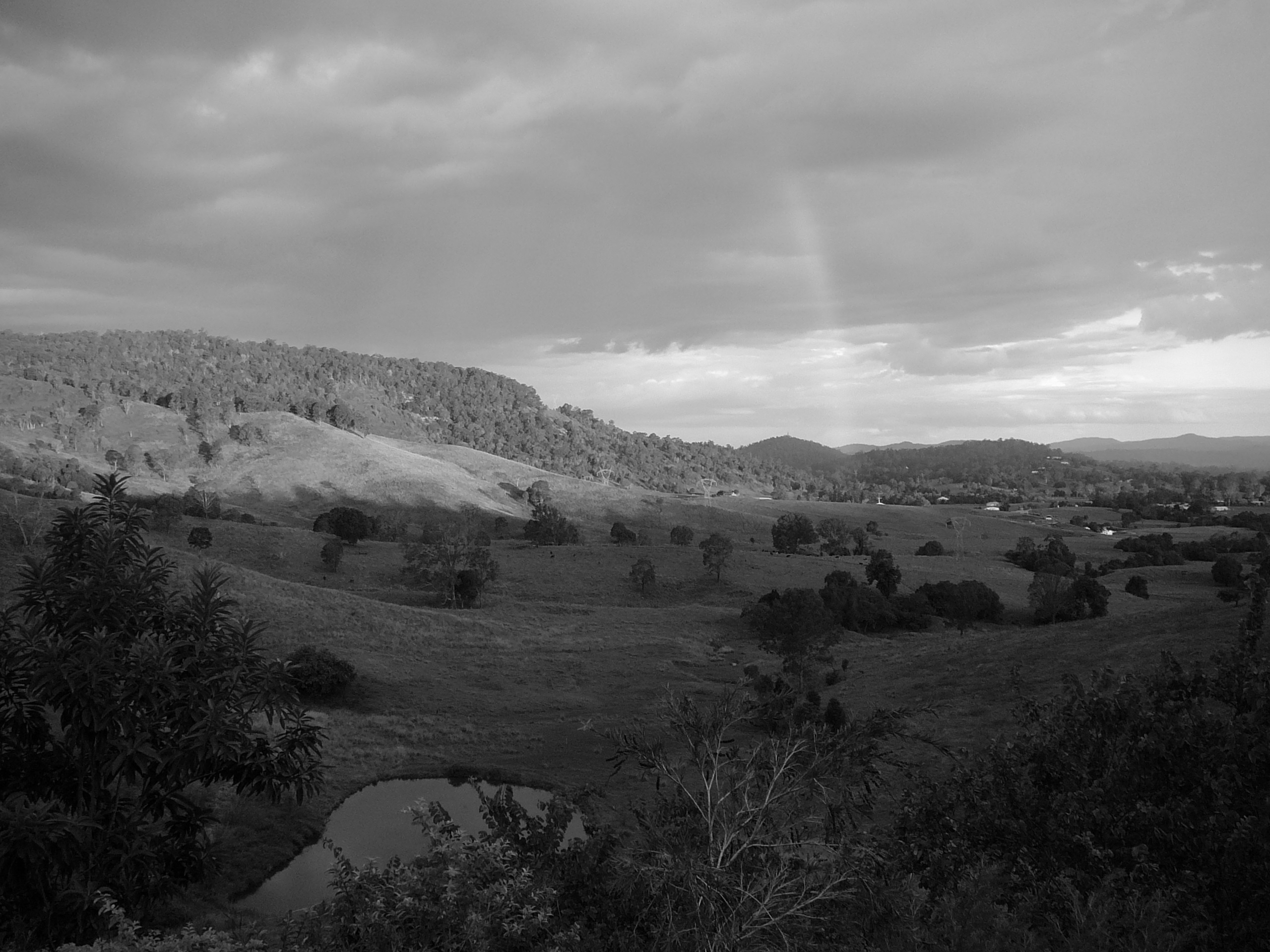 Burnished Hills with a Rainbow.jpg