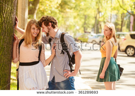 stock-photo-jealous-girl-looking-at-flirting-couple-outdoor-happy-young-woman-and-man-couple-dating-summer-361289693.jpg