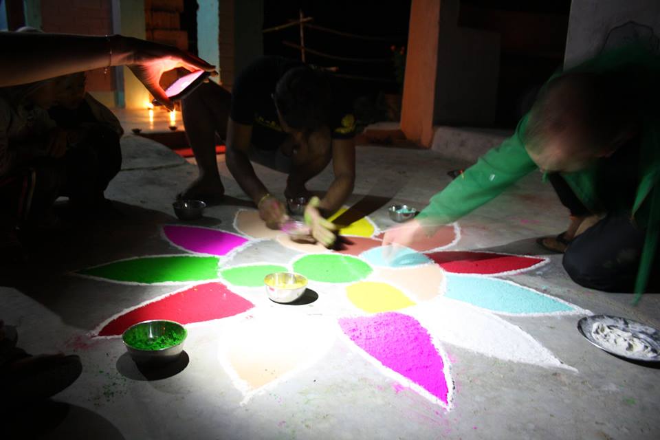 french helping to prepair for the diwali festival.jpg