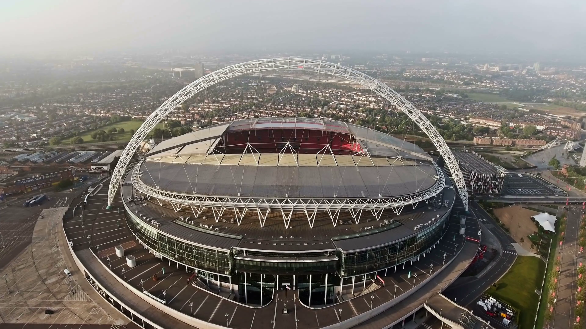 aerial-view-of-wembley-stadium-soccer-arena-flying-by-drone-shot-in-london-4k-uhd-footage_hgec2n0c_thumbnail-full01.png