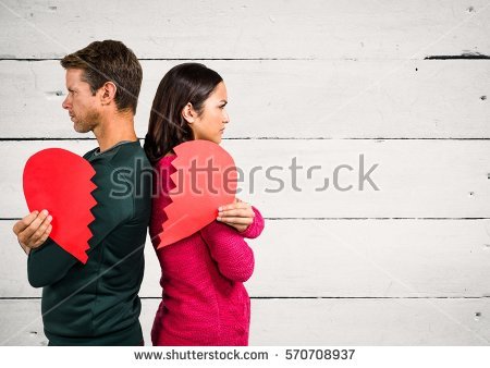 stock-photo-angry-couple-holding-broken-heart-against-wooden-background-570708937.jpg