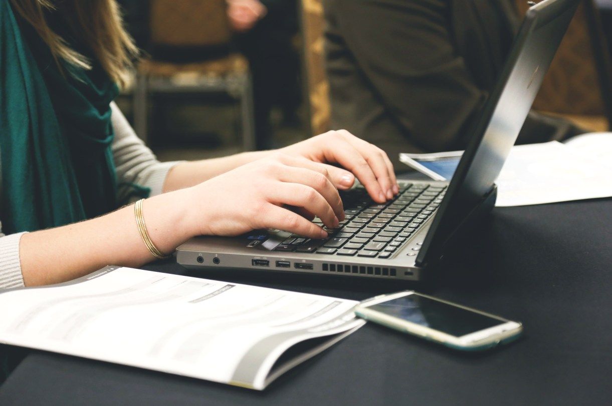 woman-typing-writing-windows.jpg