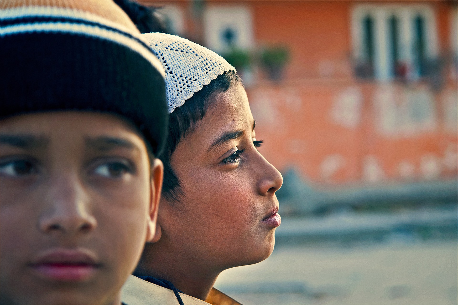 indian-boys-with-hats-looking-opposite-freedomain.jpg