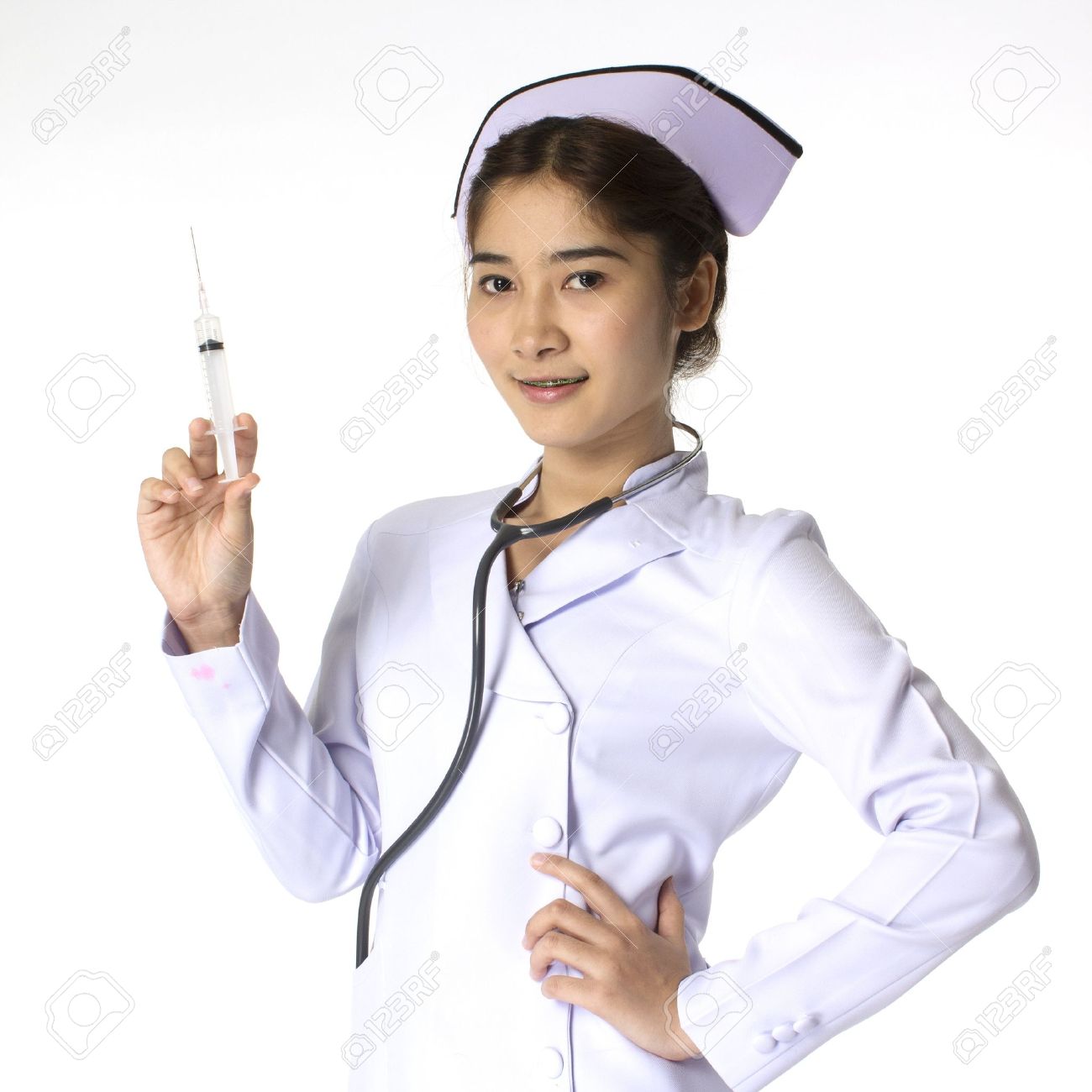 21124576-young-female-nurse-holding-syringe.jpg