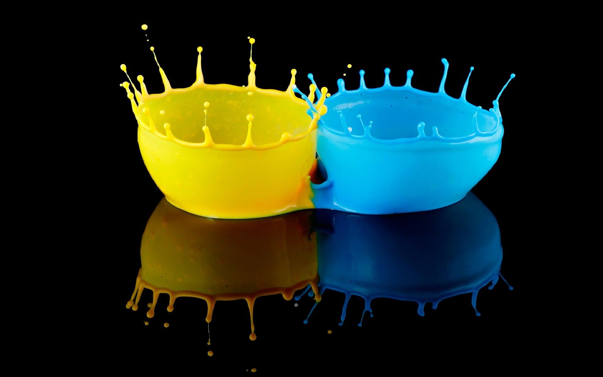 Yellow-and-blue-colors-splash-in-black.jpg