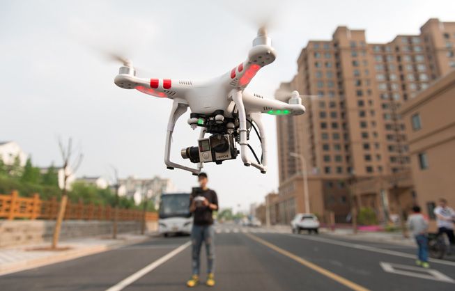 Drone-Flying-City-Street-Human-Pilot.jpg.653x0_q80_crop-smart.jpg