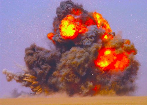 1280px-US_Navy_020712-N-5471P-010_EOD_teams_detonate_expired_ordnance_in_the_Kuwaiti_desert.jpg