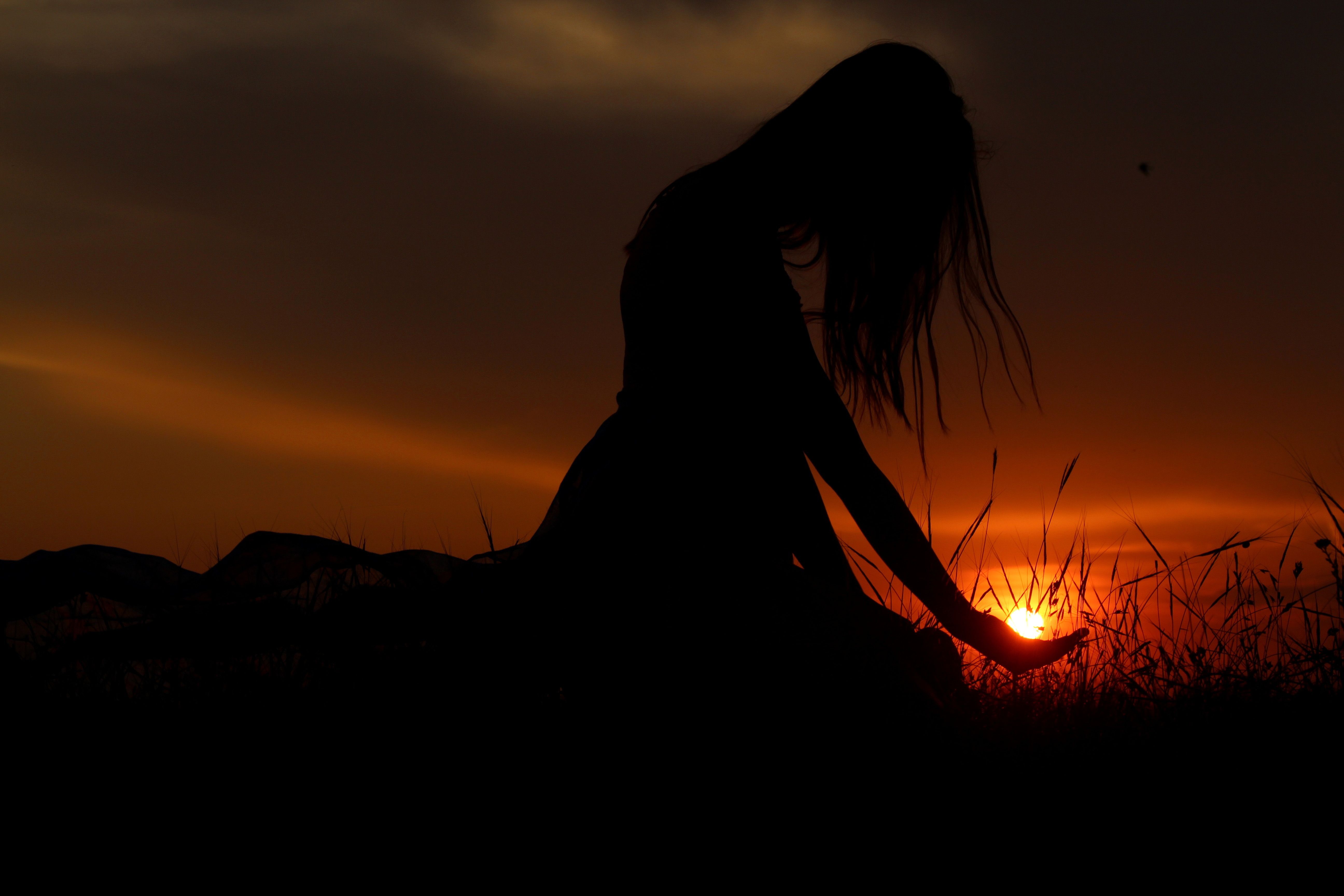 beautiful-woman-silhouette-at-sunset.jpg