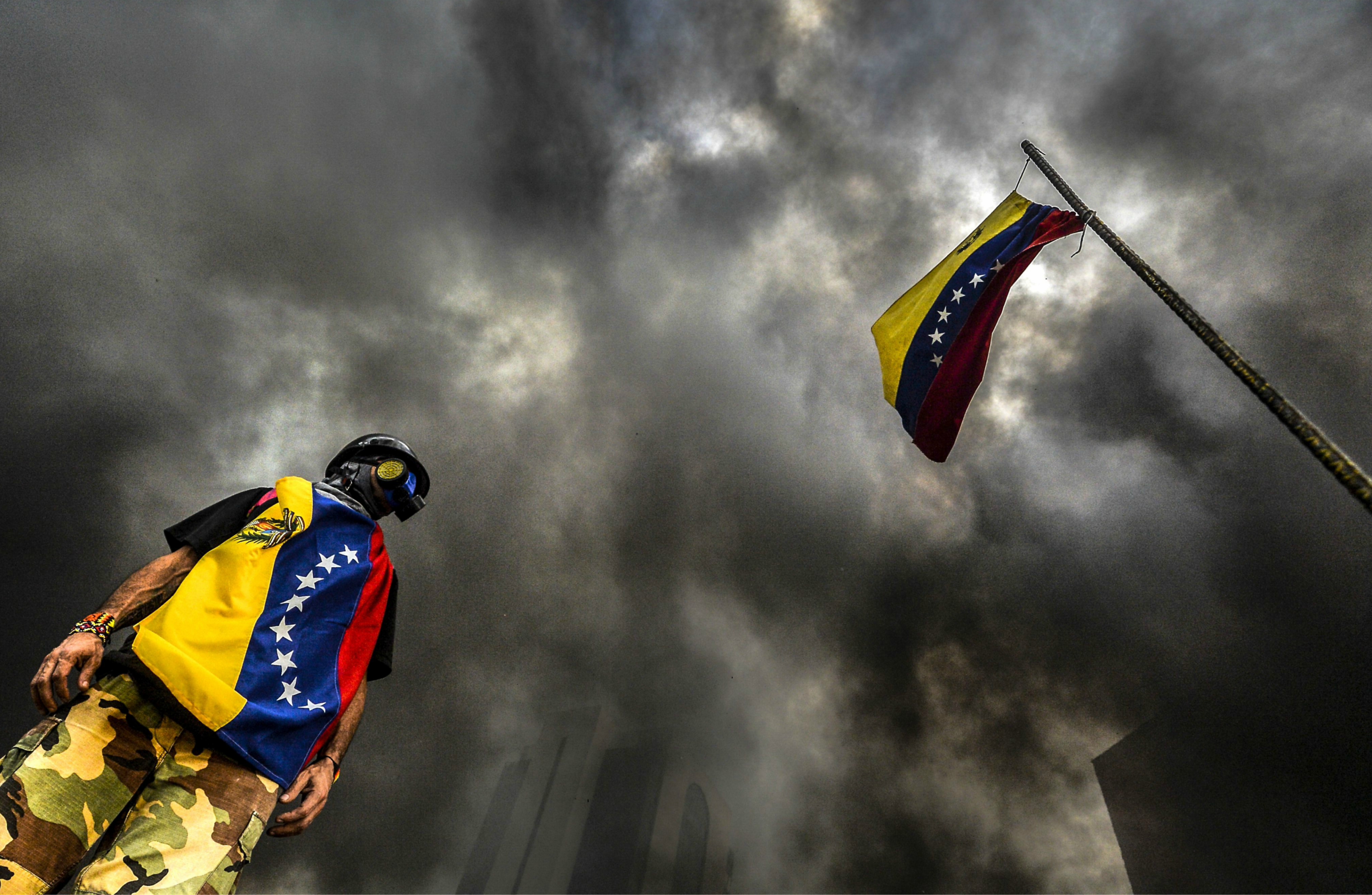 topshots-topshot-venezuela-crisis-opposition-protest_17357536.png