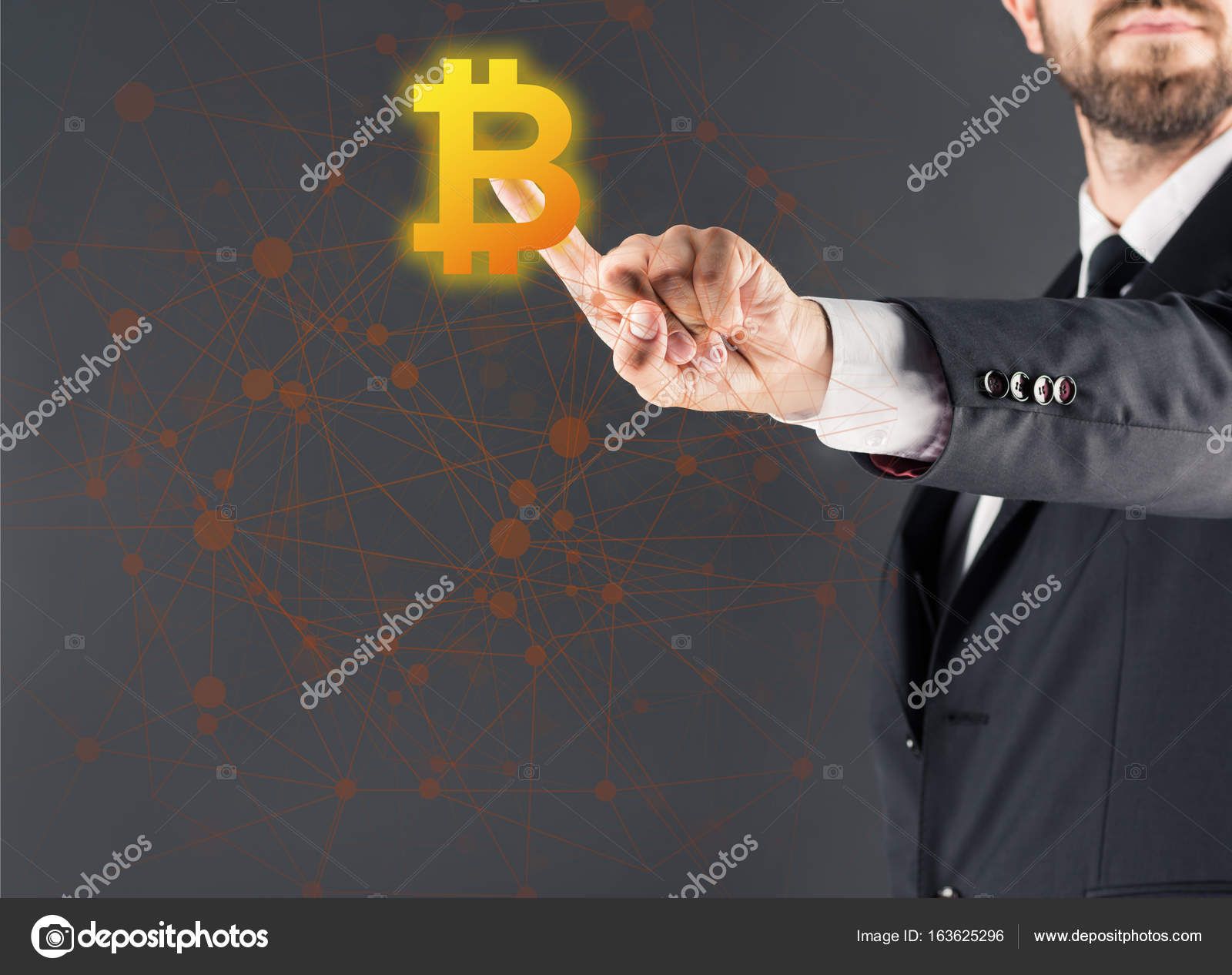 depositphotos_163625296-stock-photo-businessman-pointing-at-bitcoin.jpg