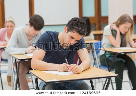 stock-photo-students-sitting-in-an-exam-hall-doing-an-exam-in-university-124139695.jpg