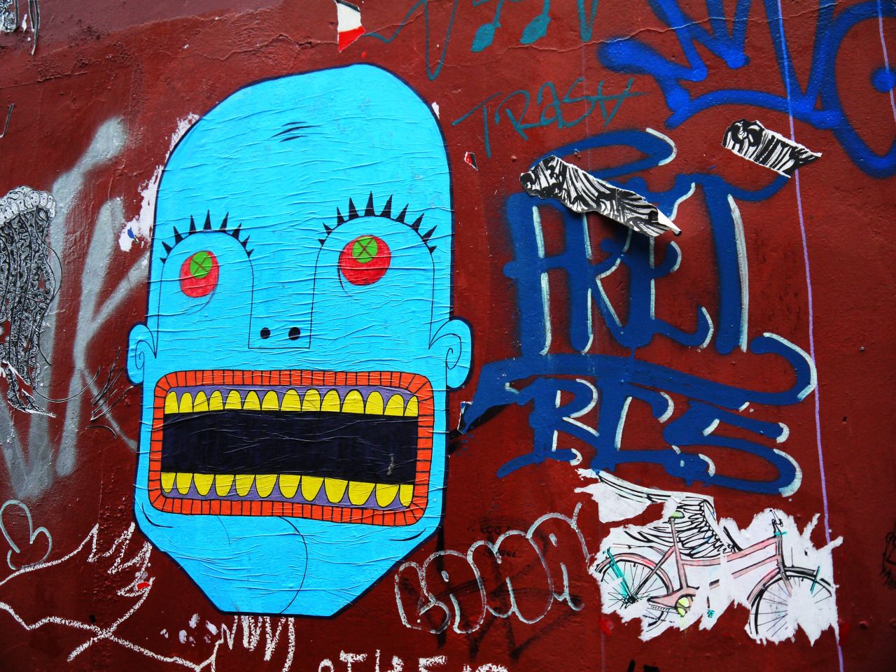 73218582048 - street art brick lane blue face tags.jpg