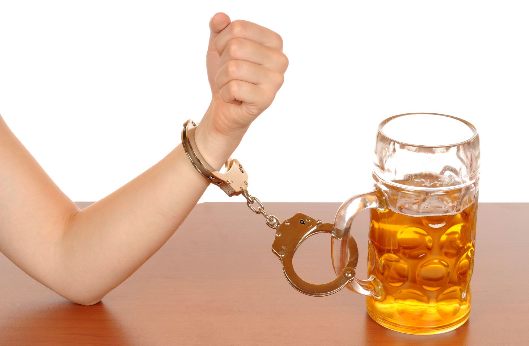 women_handcuffed_to_alcohol_drink.jpg