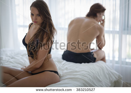 stock-photo-unhappy-couple-sitting-in-bed-away-from-each-other-woman-in-foreground-383210527.jpg