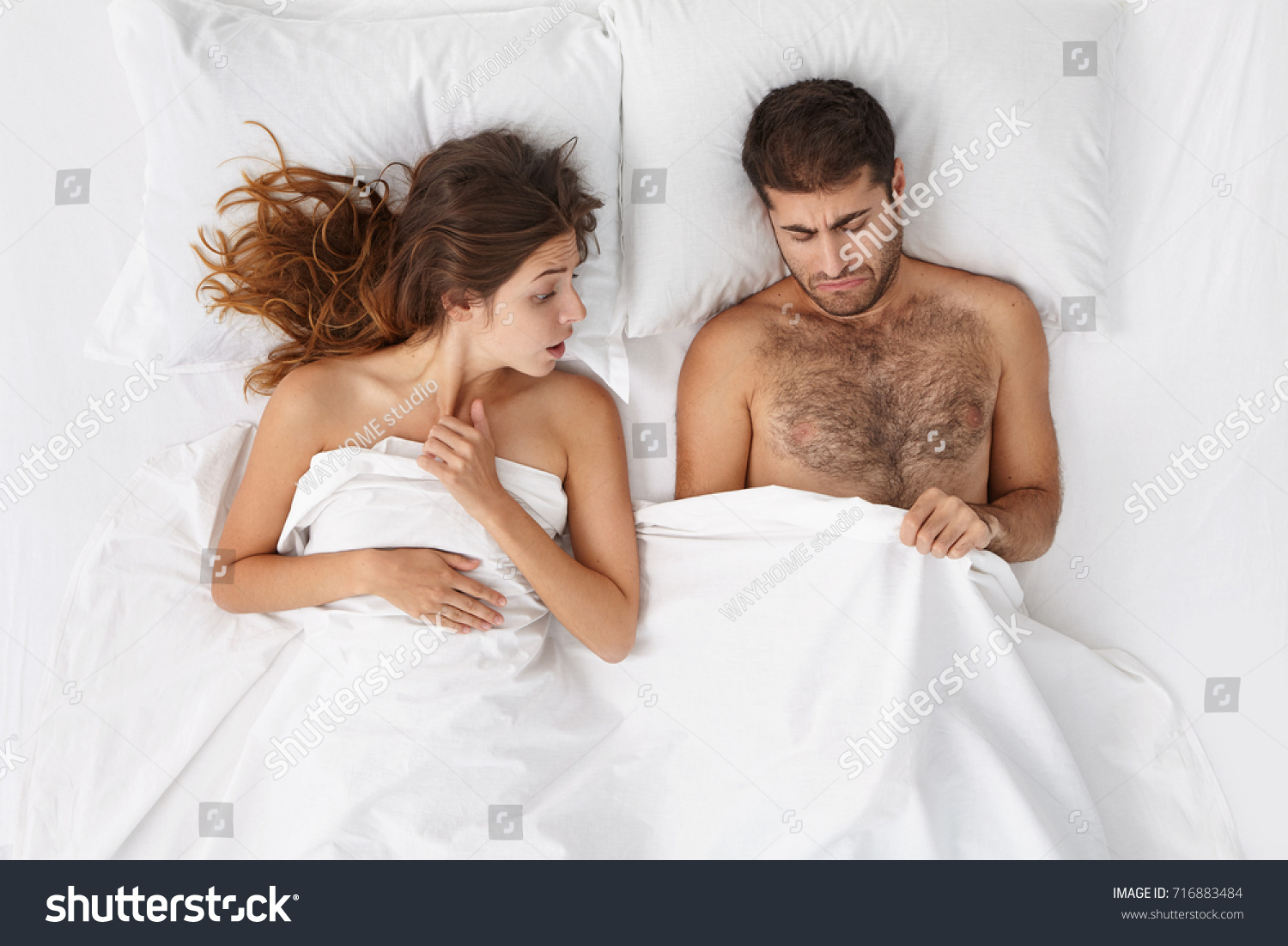 stock-photo-relationships-difficulties-stress-and-impotence-couple-having-marital-problems-woman-and-man-in-716883484.jpg