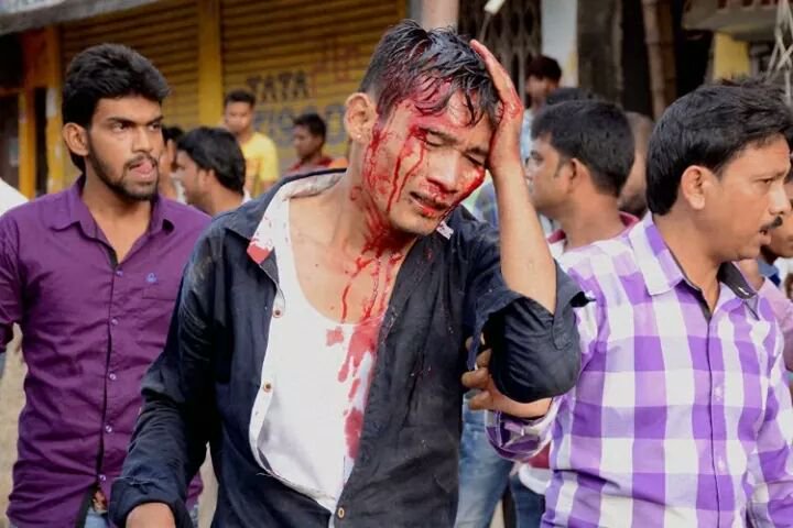 Most circulated image of native beaten up by outsiders.jpg