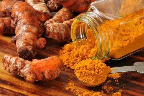 turmeric-roots-and-a-jar-of-turmeric-powder.jpg