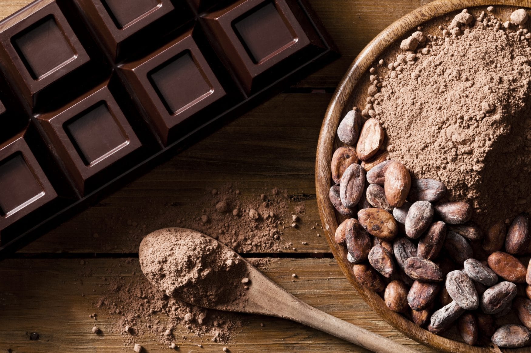 Chocolate-bar-cocoa-beans-and-ground-cocoa-shot-directly-above-000064951397_Large.jpg