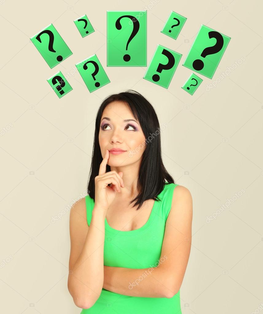 depositphotos_30231953-stock-photo-girl-thinking-surrounded-by-question.jpg