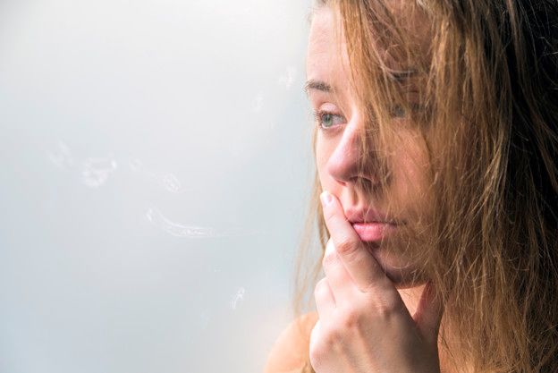 lonely-girl-near-window-thinking-about-something-beautiful-sad-lonely-girl-sitting-near-the-window-is-missing_1391-433.jpg