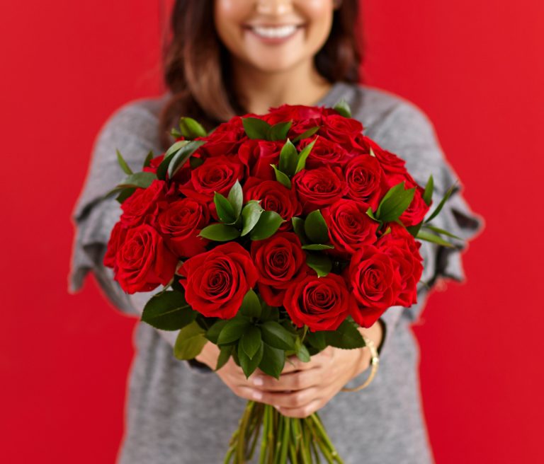 woman-with-roses-768x656.jpg