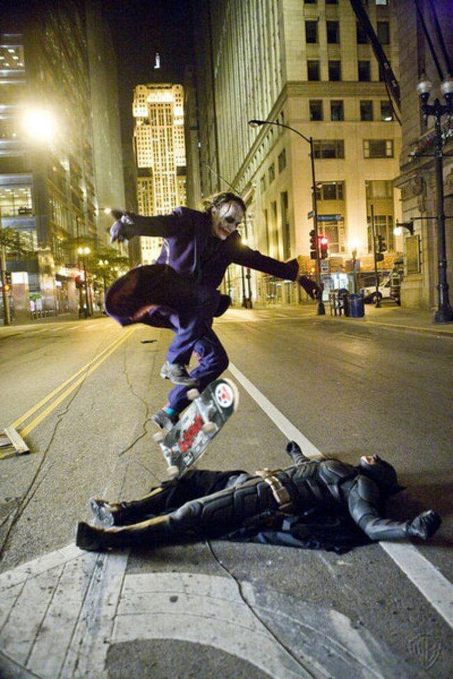 Heath-Ledger-skateboarding-over-Christian-Bale-during-a-break-while-filming-The-Dark-Night.jpg