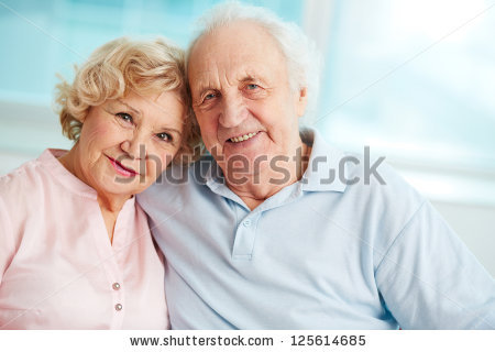 stock-photo-portrait-of-a-candid-senior-couple-enjoying-their-retirement-125614685.jpg