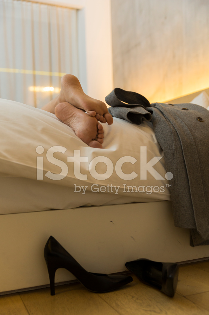 35371620-tired-businesswoman-on-bed.jpg
