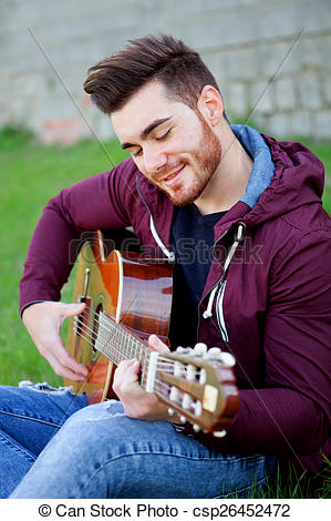 cool-handsome-guy-playing-guitar-at-picture_csp26452472.jpg