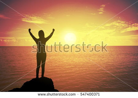 stock-photo-silhouette-of-winning-success-woman-at-sunset-or-sunrise-standing-and-raising-up-her-hand-in-547400371.jpg