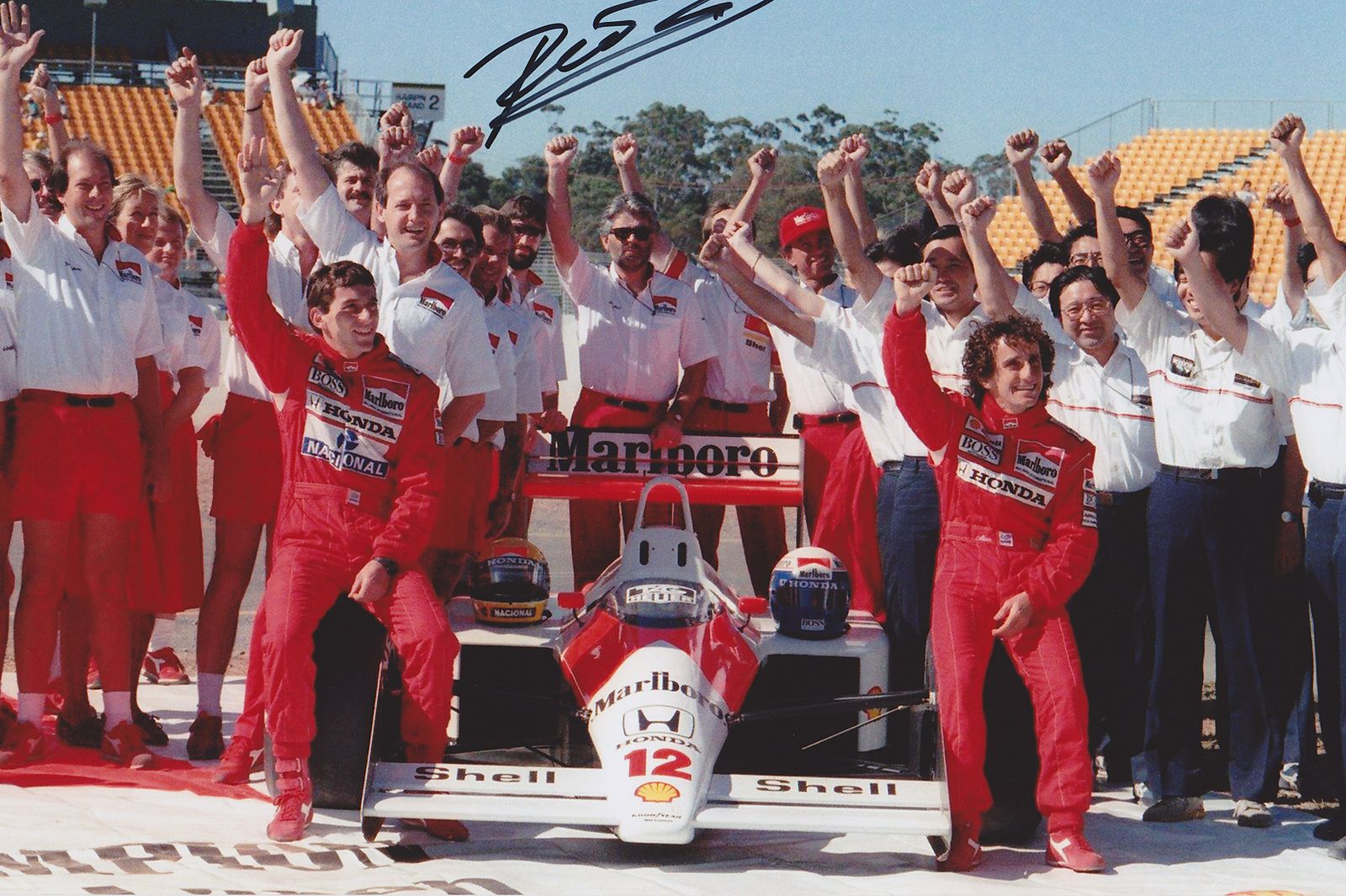 mclaren-honda-world-champion-ayrton-senna-with-his-teammate-alain-prost-and-all-members-of-the-team-staff-12-november-1988-signed-by-dennis.jpg