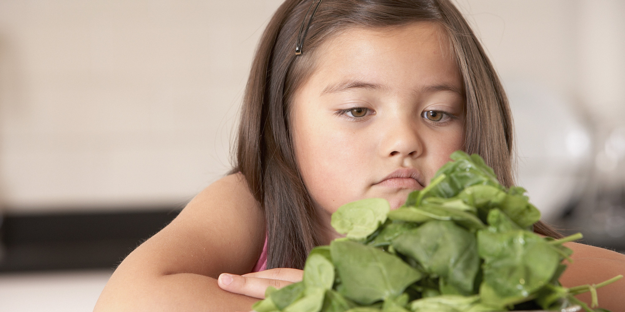 o-KID-EATING-VEGETABLES-facebook.jpg