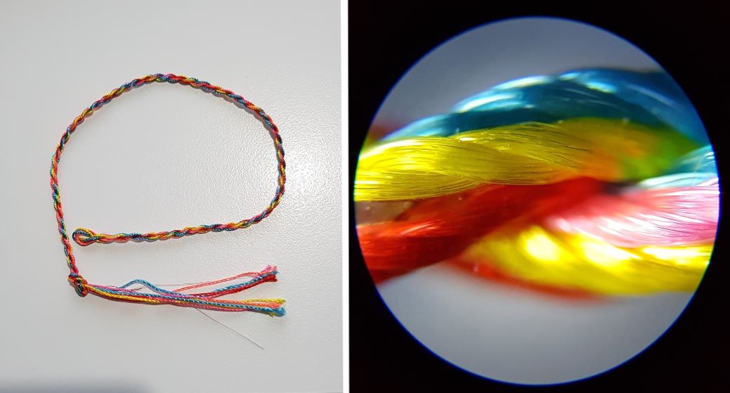 Colored threads under microscope