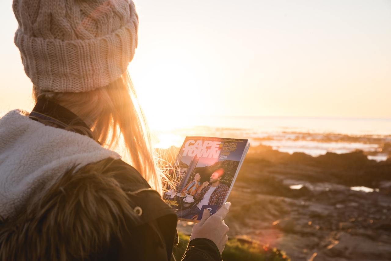 Tourist_with_visitors_guide_sunset_craig_howes.jpg