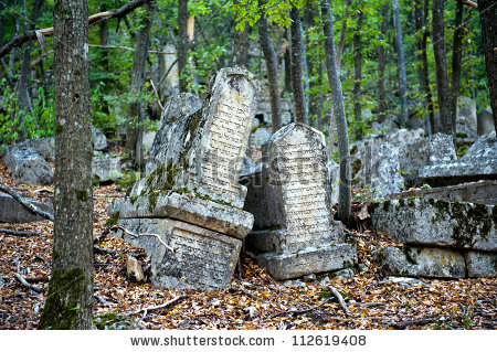 stock-photo-ancient-graves-of-people-dying-karaites-karaite-cemetery-balta-tijmez-at-chufut-kale-the-crimea-112619408.jpg