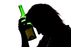 silhouette-sad-man-drinking-alcohol-18451571.jpg