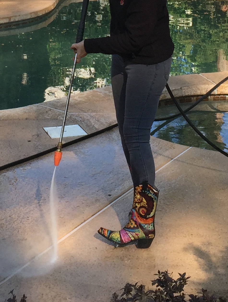 Power washing in boots.jpg