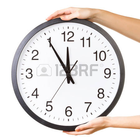 29435717-woman-holding-a-big-clock-isolated-on-a-white-background-anti-clockwise-or-counter-clockwise-time-co.jpg