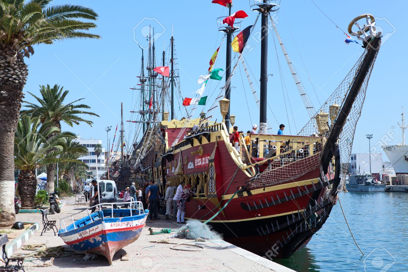 16284620-SOUSSE-TUNISIA-CIRCA-MAY-2012-City-embankment-with-beautiful-vessels-Excursion-style-of-old-ship-on-Stock-Photo.jpg