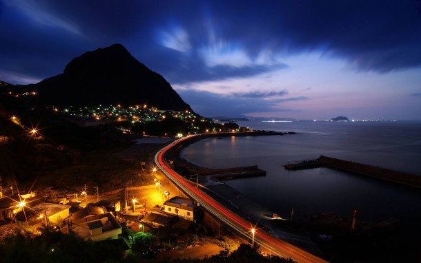 some-kind-of-cove-or-harbour-at-night-with-a-mountain-in-the-background-dark-neon-lights-lens-flares-11990.jpg