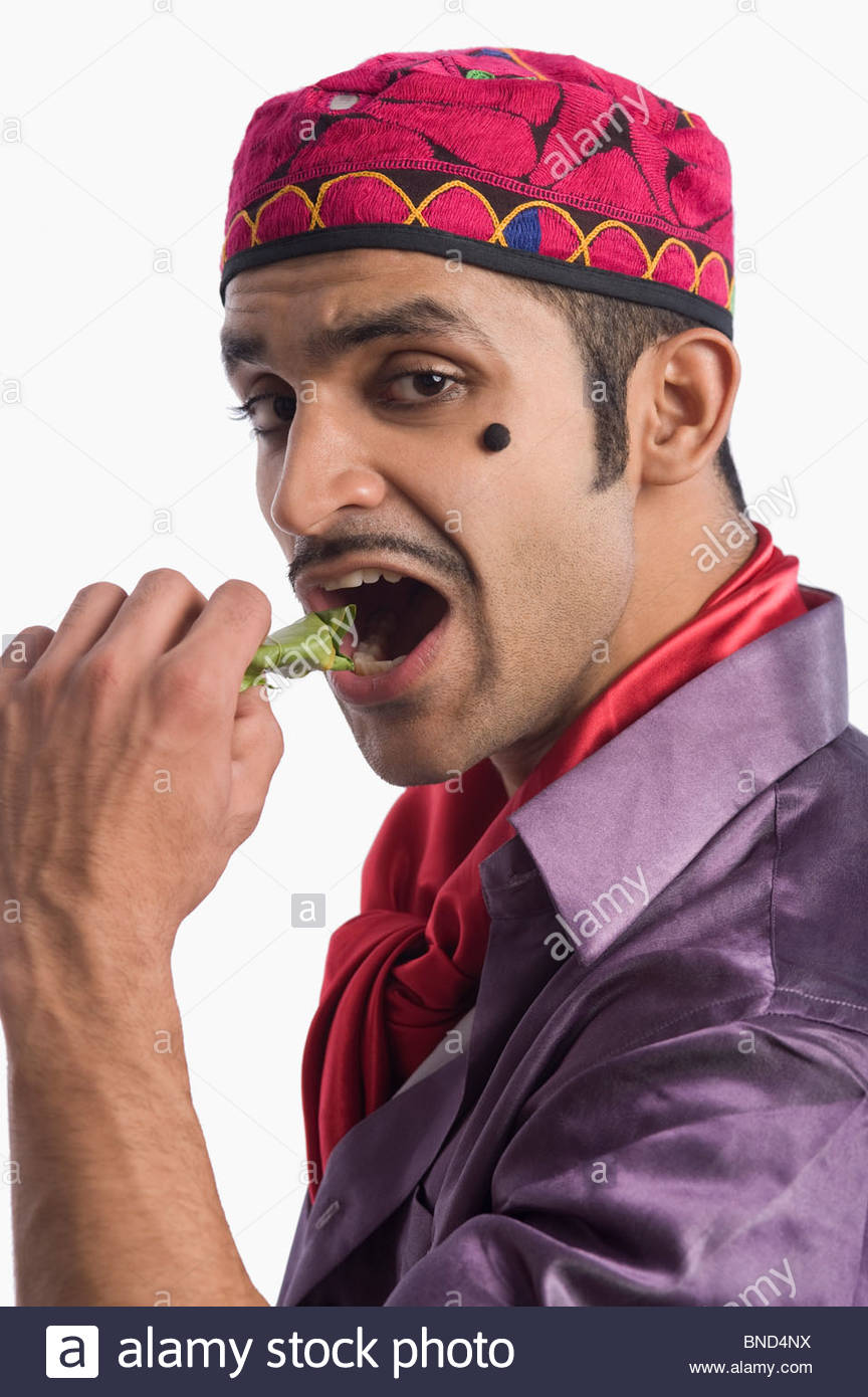 portrait-of-an-actor-portraying-a-tapori-eating-pan-BND4NX.jpg