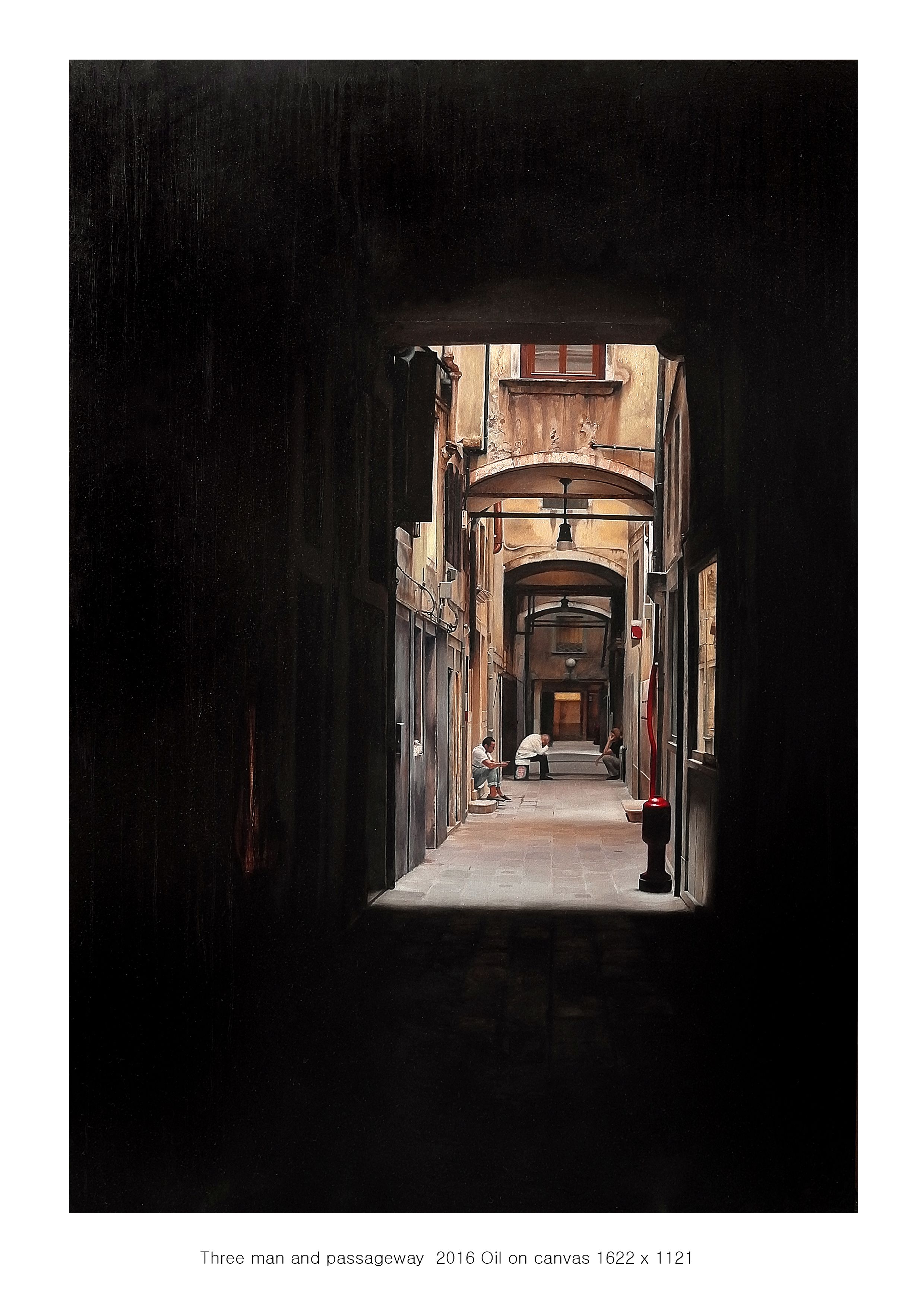 Three men and passageway.jpg