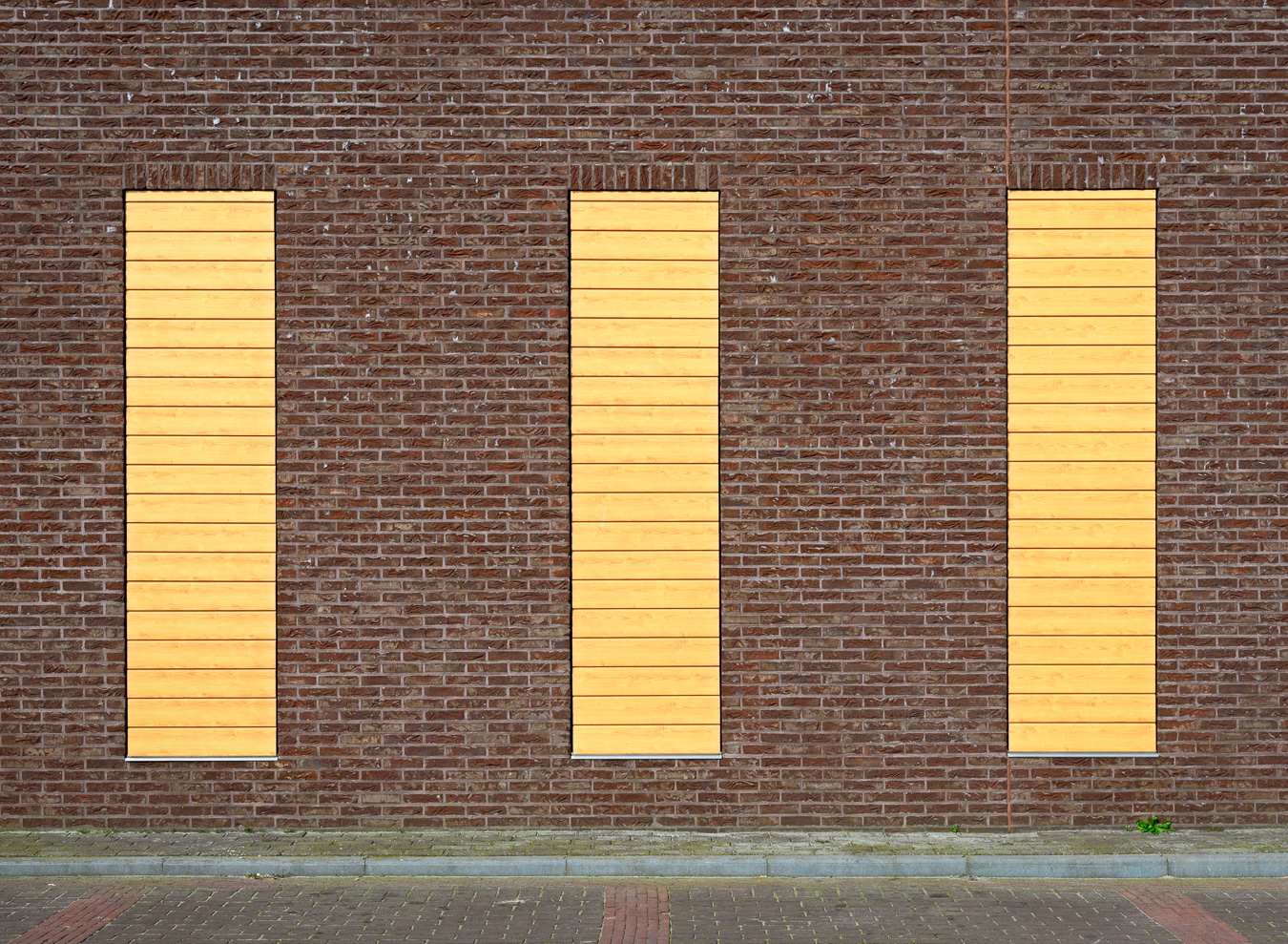 Blinded windows with yellow boards