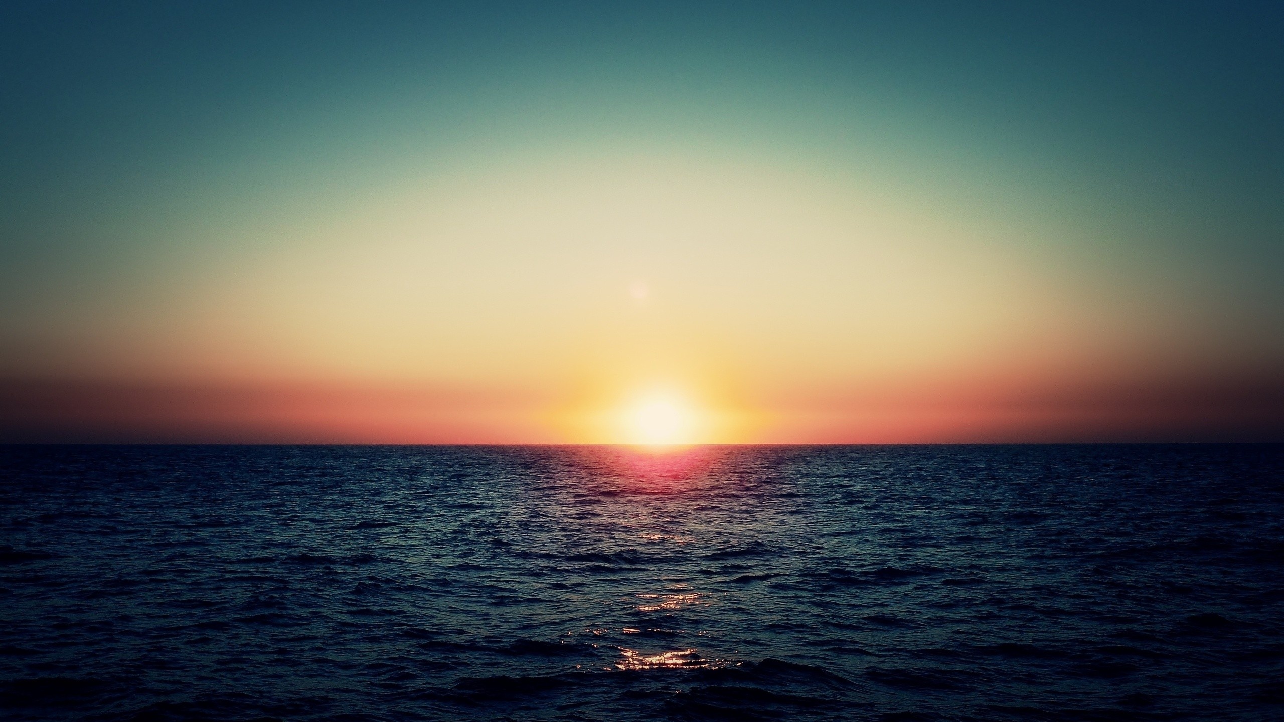ws_Sunset_at_Sea_2560x1440.jpg
