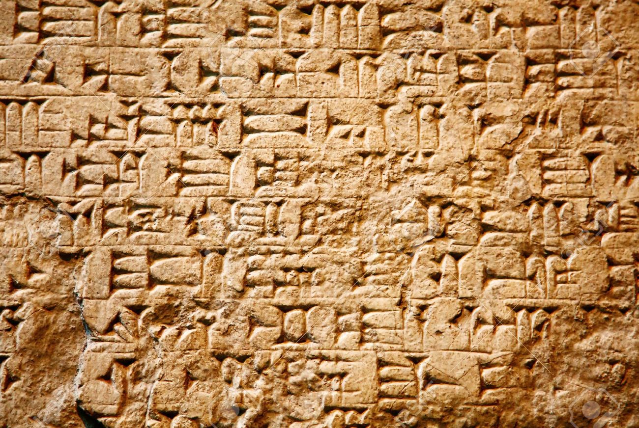 7309601-Cuneiform-writing-of-the-ancient-Sumerian-or-Assyrian-civilization-in-Iraq-Stock-Photo.jpg