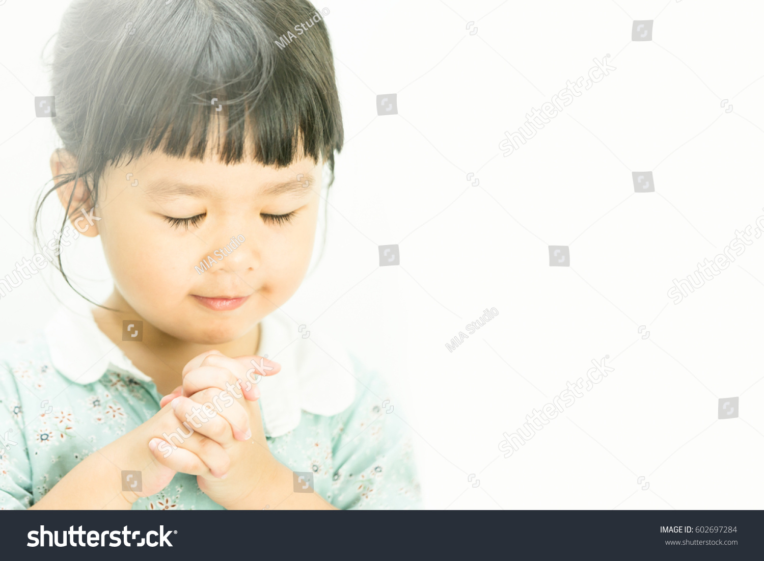 stock-photo-little-girl-praying-in-the-morning-little-asian-girl-hand-praying-hands-folded-in-prayer-concept-602697284.jpg