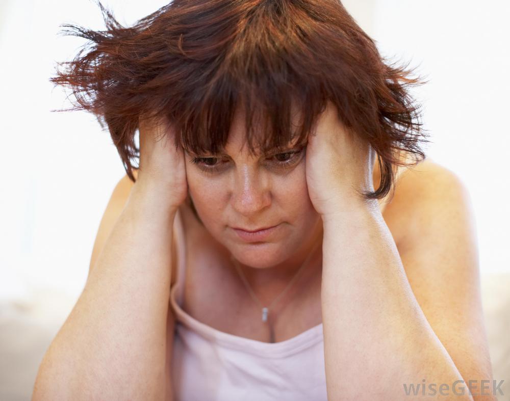 stressed-woman-with-hands-in-her-hair.jpg